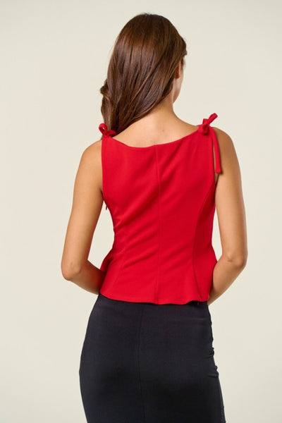 Stand Out Bow Peplum Top