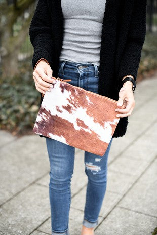 The Carrie Cow Print Clutch
